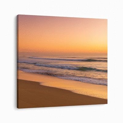 Sunrise over a beautiful Wollongong beach with calm waves and golden sand
